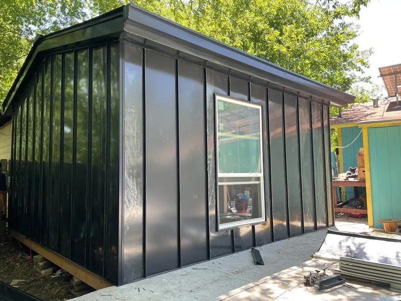 Black standing seam metal wall panels for Metal Roof Installation in Dalton